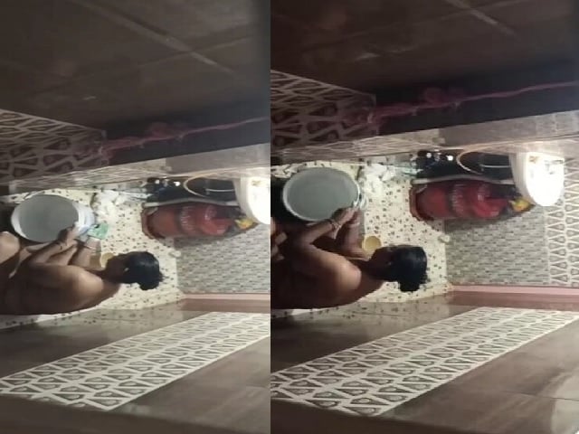 Neighbor aunty taking bath caught by voyeur